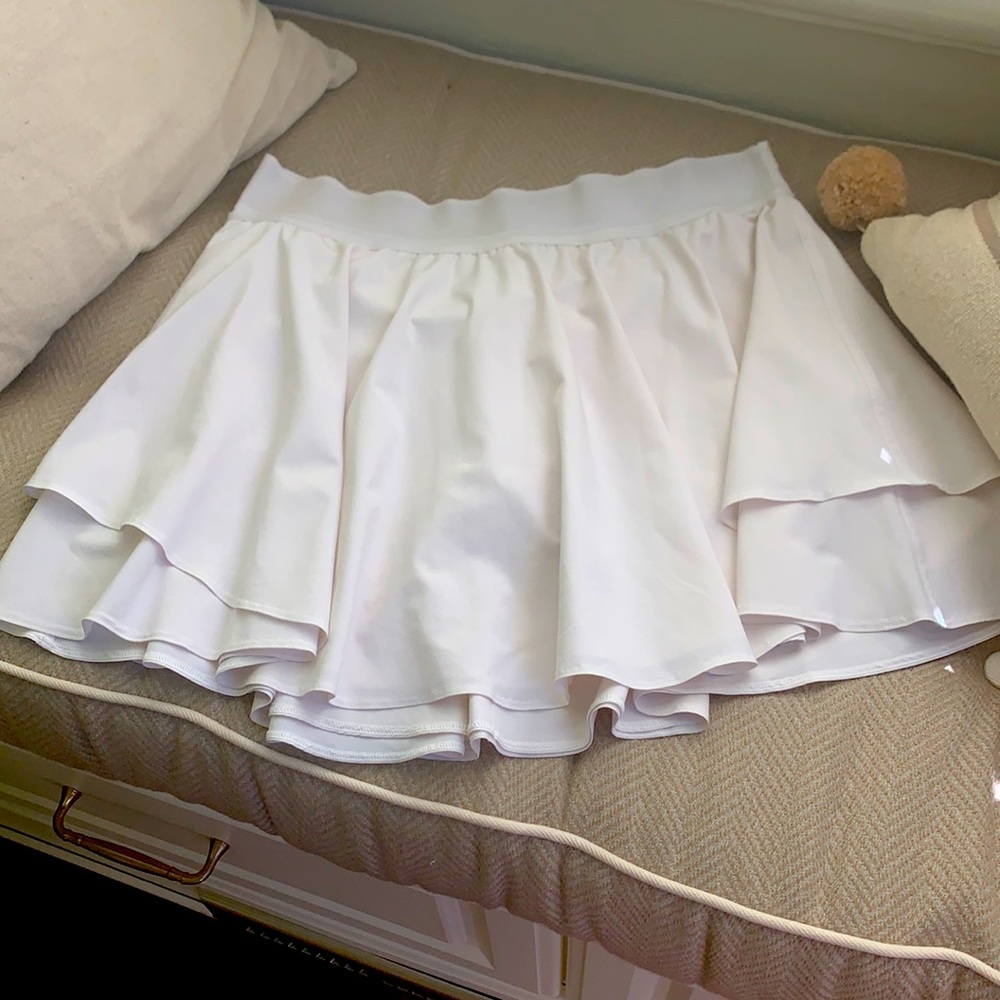 Court rival white Lululemon tennis skirt.
